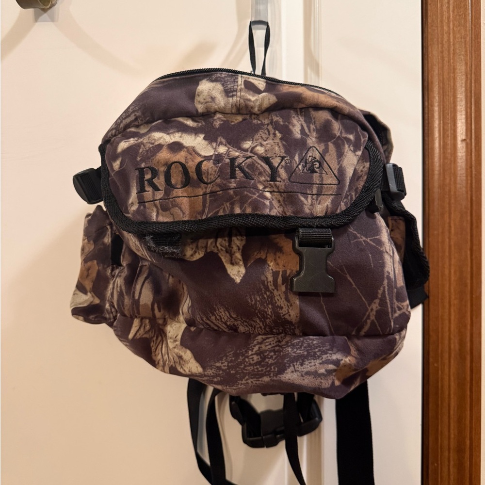 Rocky Brown and Black hunting dog Camouflage Backpack. Could be worn on dog